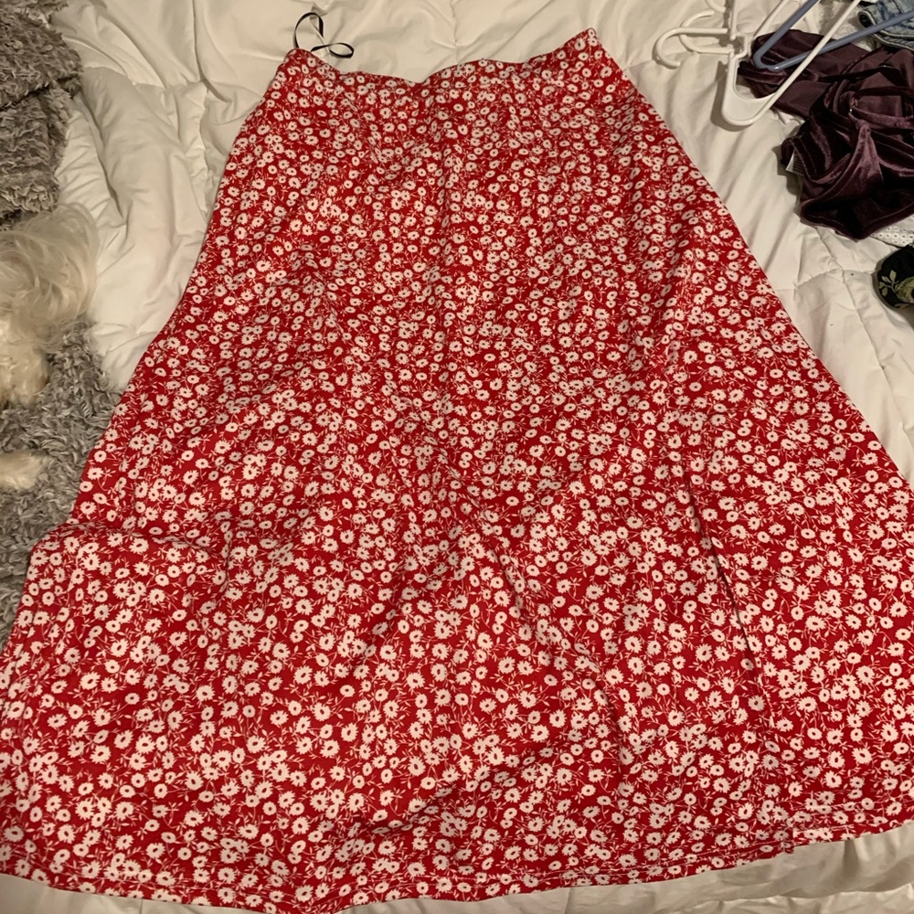 Red skirt with white flower detail